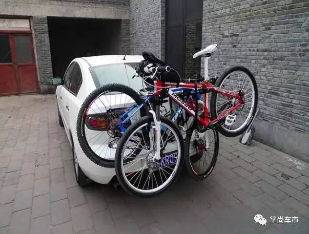 私家车车顶放自行车合法吗,车顶装小自行车违法吗