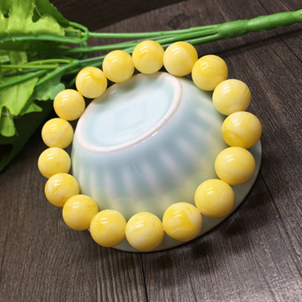 刚买回的蜜蜡为何油乎乎的,蜜蜡买回来后分层了