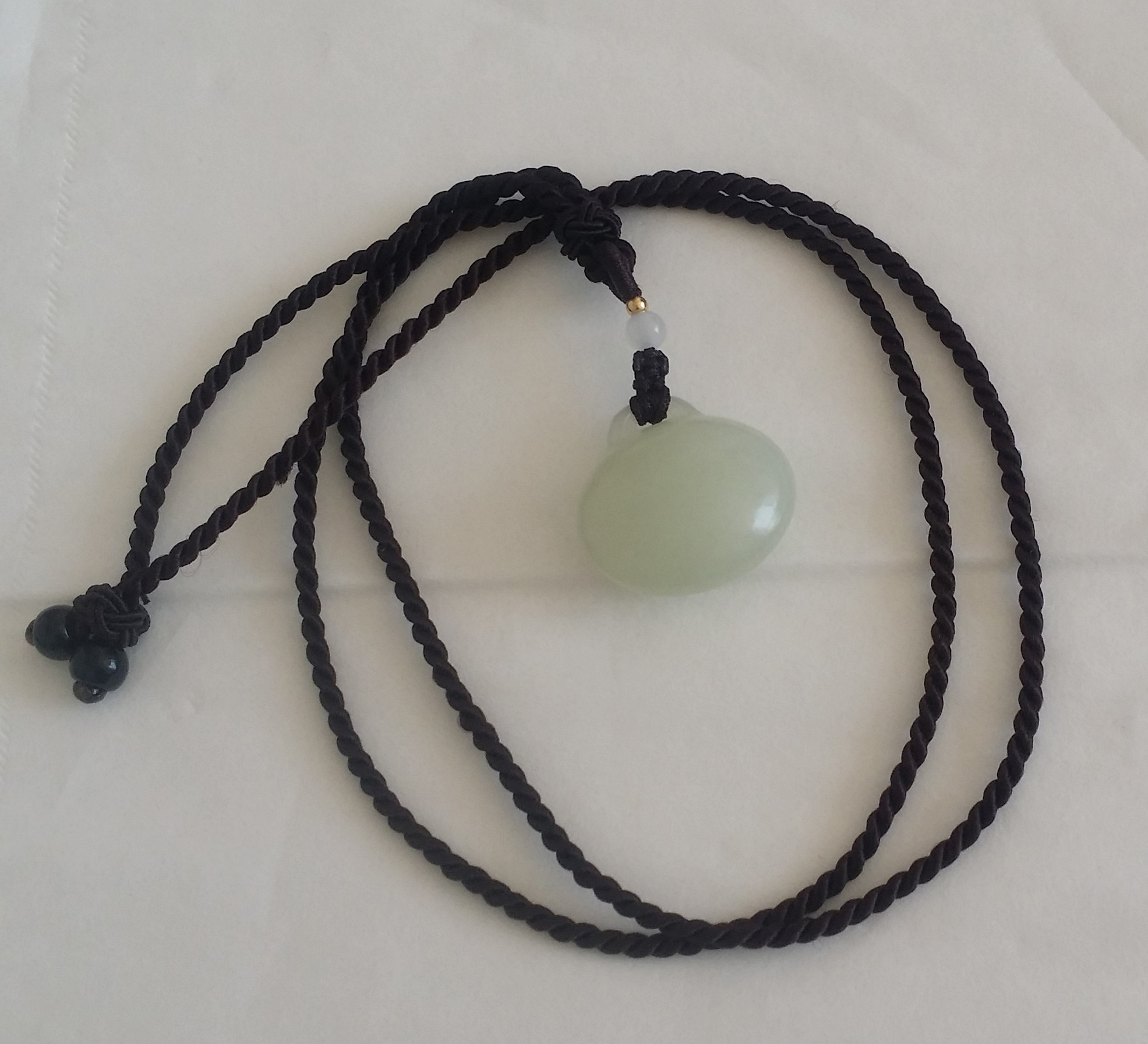 说一下我入手的第一块小石头（和田玉锁）