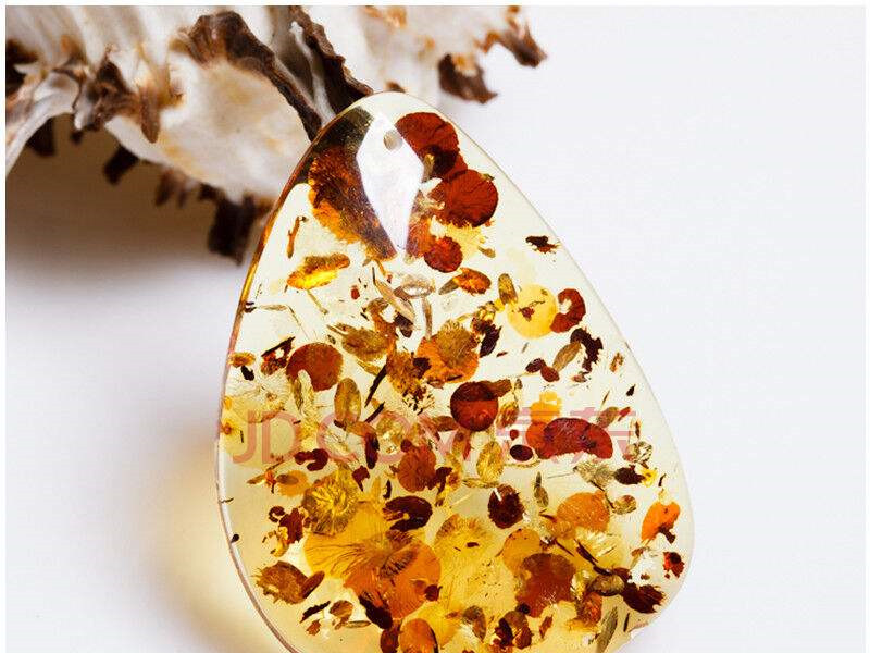 花珀人工爆花可以过检吗,人工爆花的花珀是假的吗