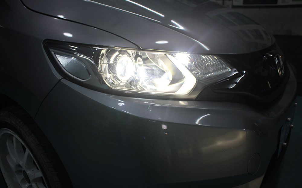 本田飞度升级欧司朗led透镜,本田飞度大灯升级海拉五双光透镜