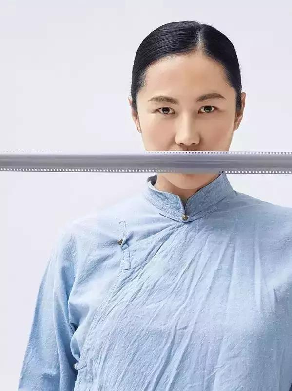 与窦唯相爱相杀十年的她，用记录了中国那个不朽的摇滚时代