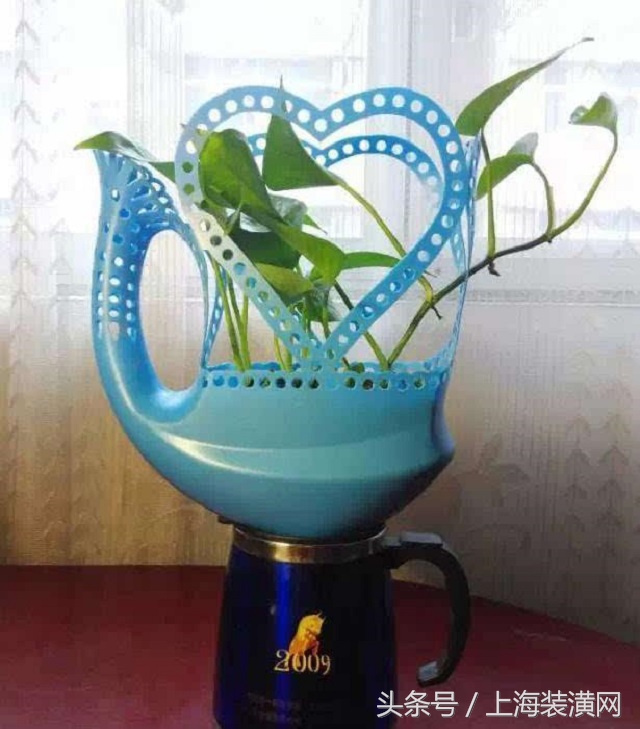 粉色洗衣液瓶子做花盆教程视频,洗衣液瓶子制作天鹅花盆方法图片