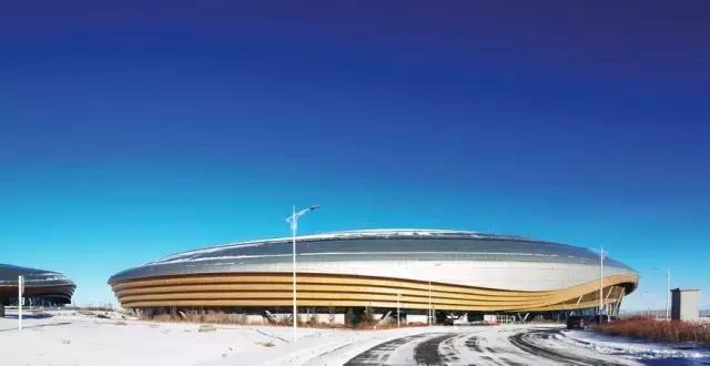 梅洪元丝路花谷孕育寒地建筑第十三届全国冬季运动会冰上运动中心