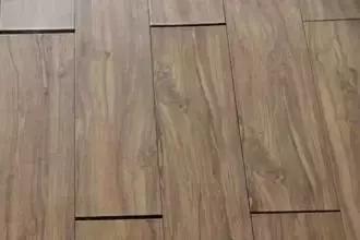 地板大面积拱起补救的办法,地板接缝凸起和裂缝怎么处理