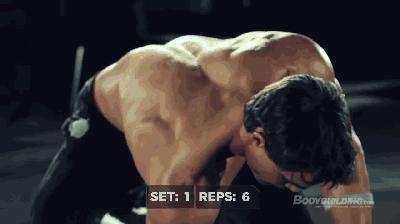 健身大叔健身房练背部最好的动作,健身男模背影高清图片