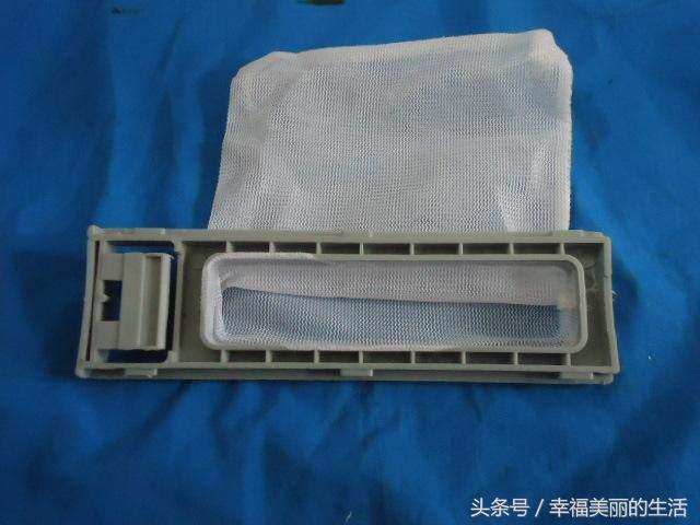 松下洗衣机底部过滤网怎么清洗,洗衣机边上过滤网拆卸清洗方法
