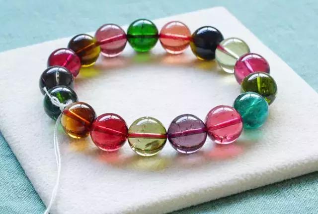 碧玺注胶和优化的区别,碧玺充胶辨别