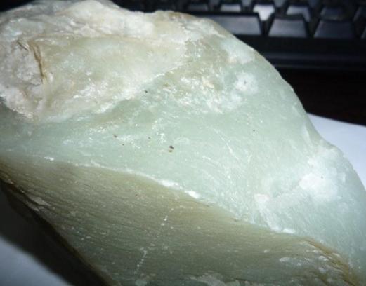 羊脂玉山料和籽料的区别,籽料和山料的区别哪个好