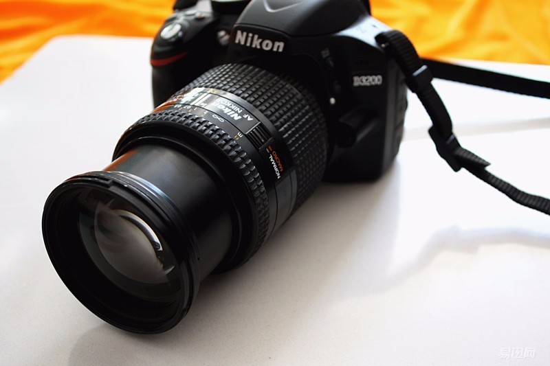 佳能尼康人像对比入门,尼康佳能入门长焦