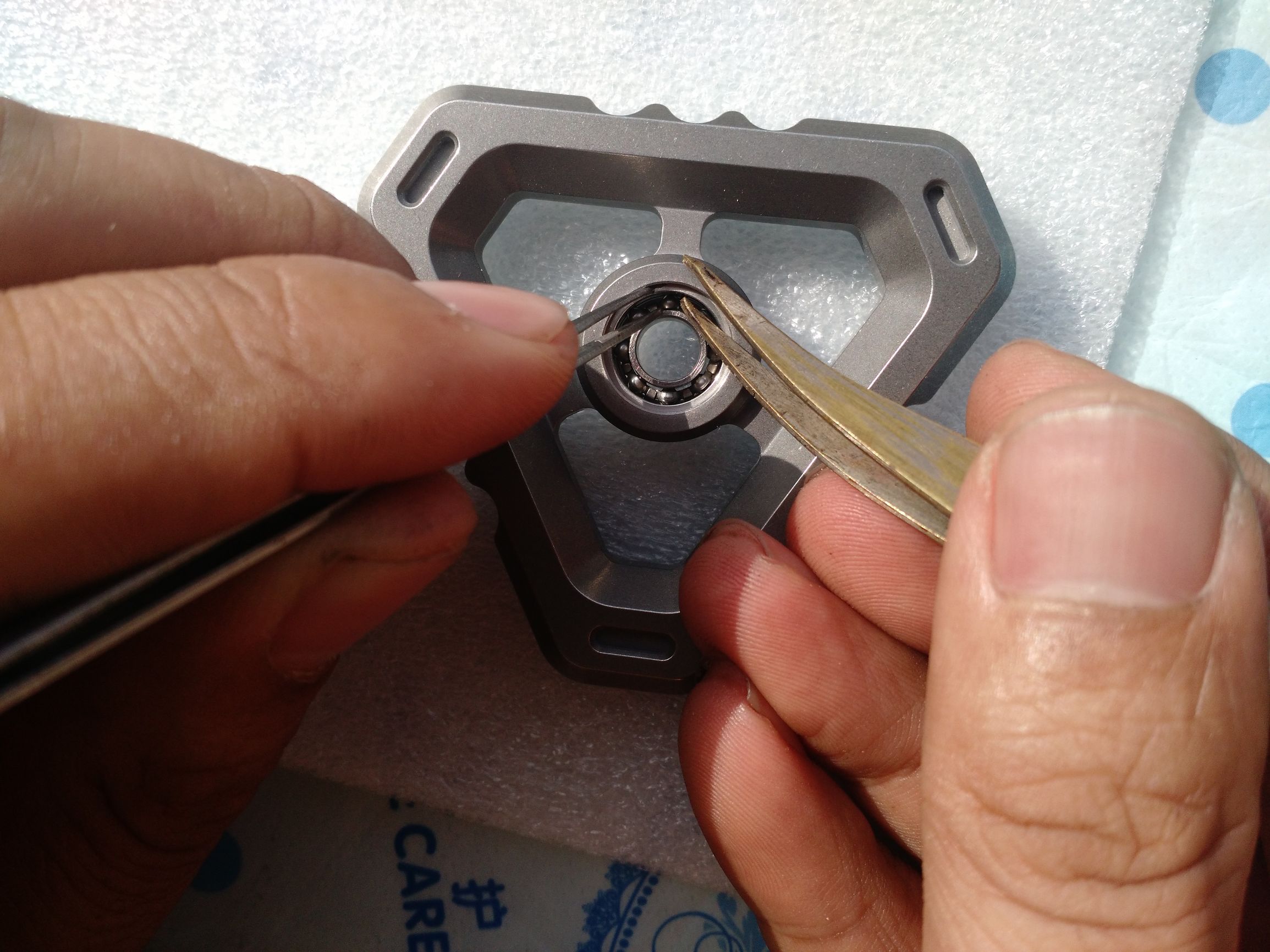 指尖陀螺怎样换轴,指尖陀螺如何更换中间的轴