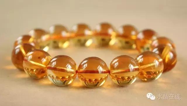怎么判断黄水晶吊牌真假,如何辨别真假黄水晶能量柱