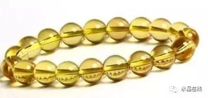 怎么判断黄水晶吊牌真假,如何辨别真假黄水晶能量柱