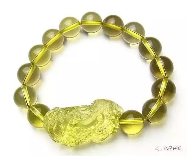 怎么判断黄水晶吊牌真假,如何辨别真假黄水晶能量柱