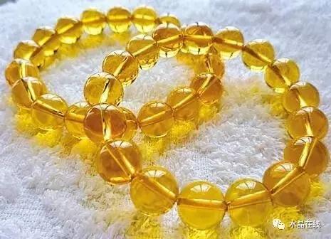 怎么判断黄水晶吊牌真假,如何辨别真假黄水晶能量柱