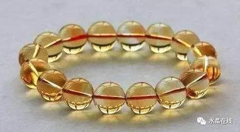 怎么判断黄水晶吊牌真假,如何辨别真假黄水晶能量柱