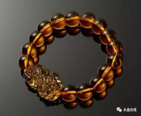 怎么判断黄水晶吊牌真假,如何辨别真假黄水晶能量柱