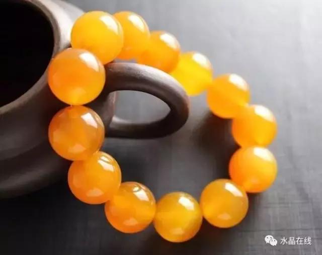 怎么判断黄水晶吊牌真假,如何辨别真假黄水晶能量柱