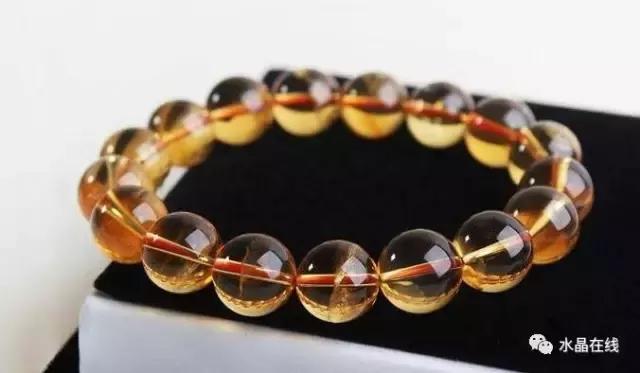 怎么判断黄水晶吊牌真假,如何辨别真假黄水晶能量柱