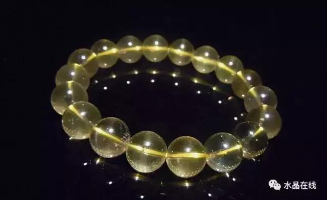 怎么判断黄水晶吊牌真假,如何辨别真假黄水晶能量柱