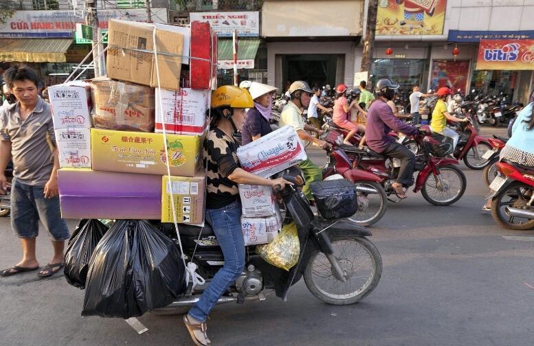 在越南骑摩托车游,越南人骑摩托车旅游中国