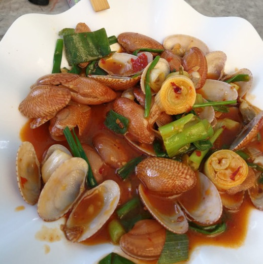 邂逅美丽椰城海口自由行攻略,海南岛自驾游摘椰子