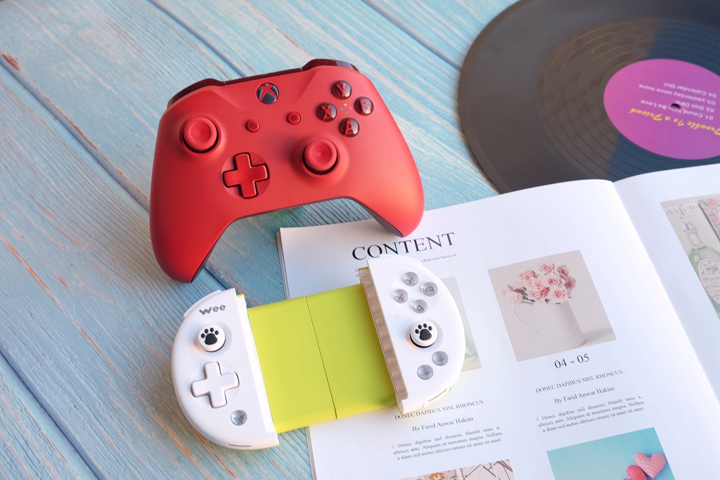 用触摸屏打游戏的朋友可以放下了，被229元手柄的体感震撼到了