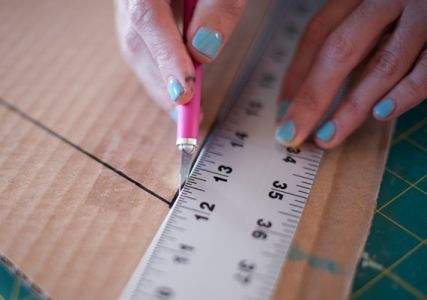 用废弃的快递箱做收纳本子,用小快递盒做收纳