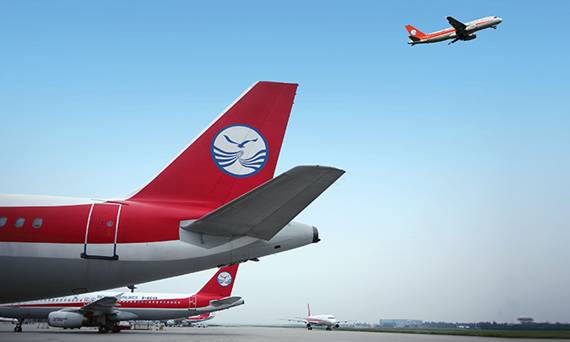 上午在广州捂白过严冬，下午在塞班岛放肆晒黑