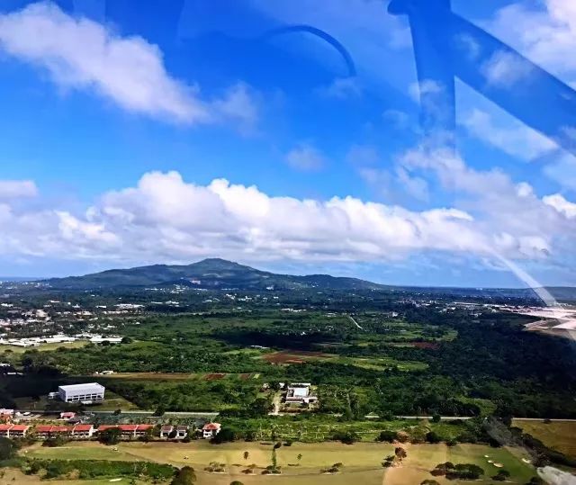 上午在广州捂白过严冬，下午在塞班岛放肆晒黑