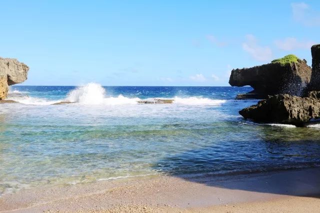 上午在广州捂白过严冬，下午在塞班岛放肆晒黑