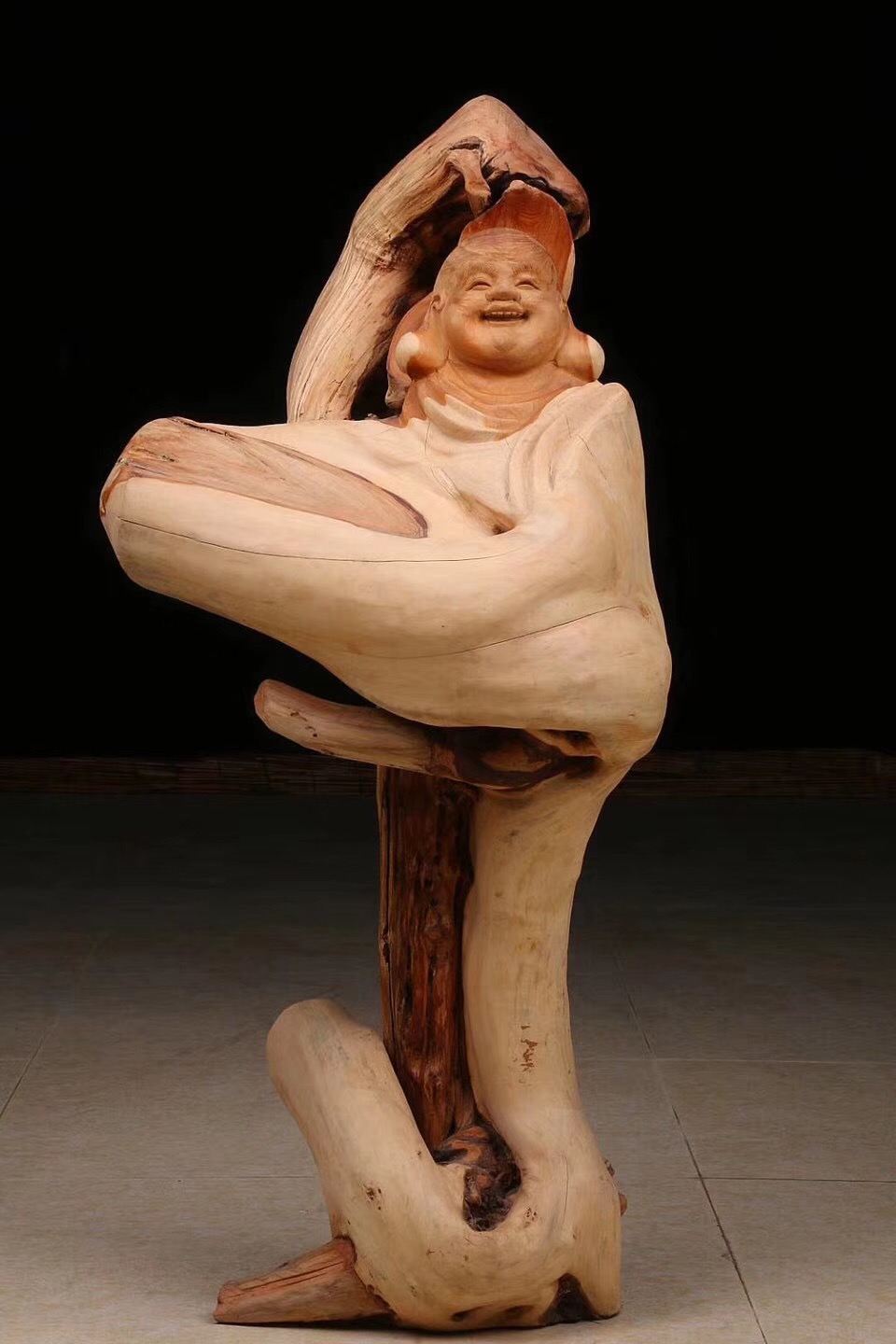 弥勒佛摆放什么位置好,木雕弥勒佛家中摆放有什么讲究