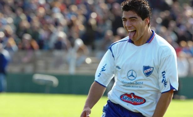 苏牙苏亚雷斯资料,苏亚雷斯的龅牙