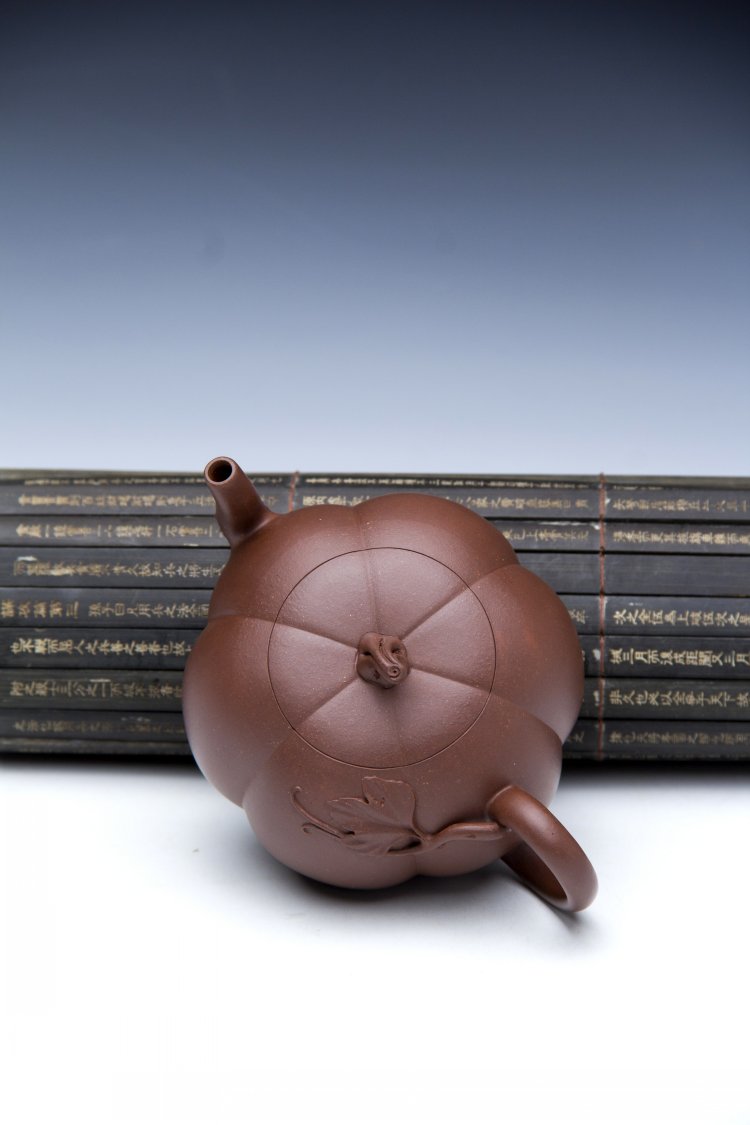 为啥紫砂壶是黄色的,为什么紫砂壶有绿色的呀