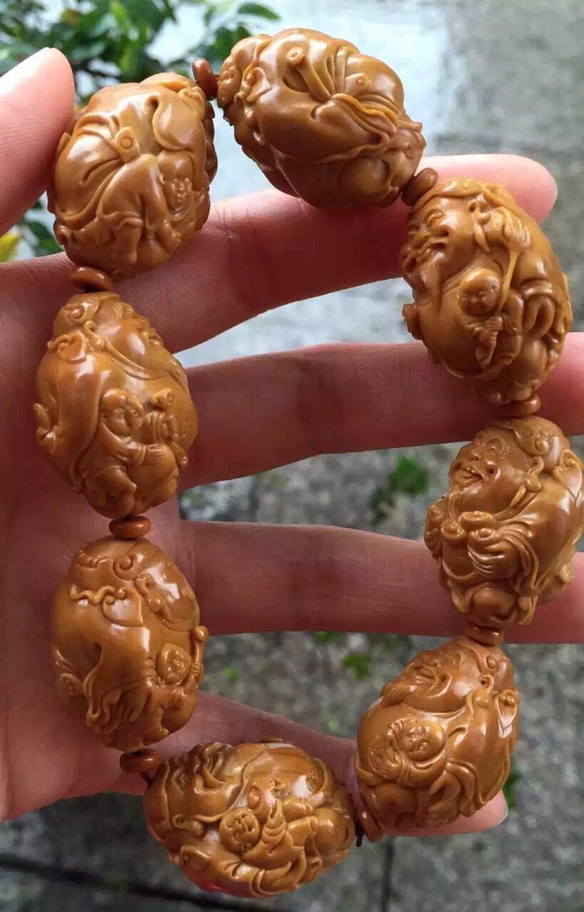 橄榄核雕有点轻怎么处理,橄榄核雕脏了可不可以洗