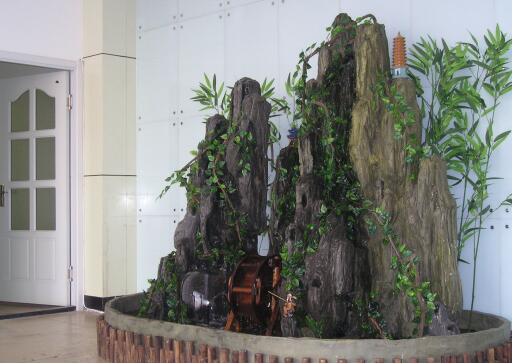 家里放假山有什么不好的说法吗,房子后面做假山有什么好处