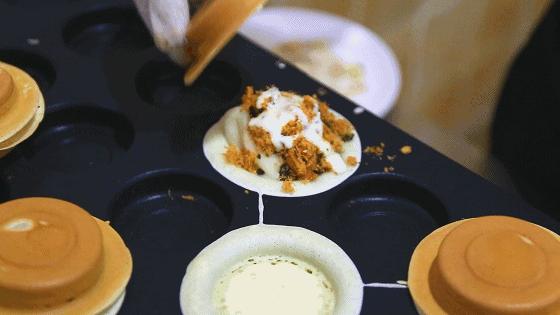 杨家坪大洋百货车轮饼,车轮饼摆摊火爆