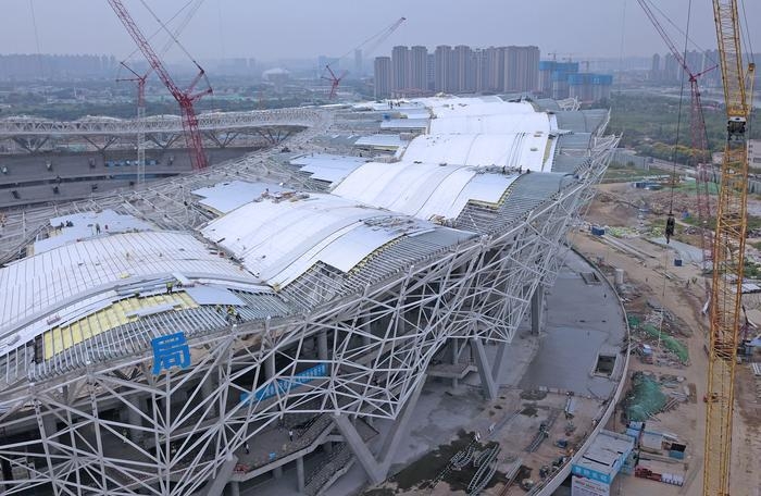 “铁裁缝”“拼图游戏”——记者独家探秘“三中心”黑科技