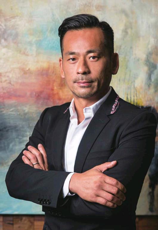 揭秘周焯华的跌宕人生,周焯华发家史