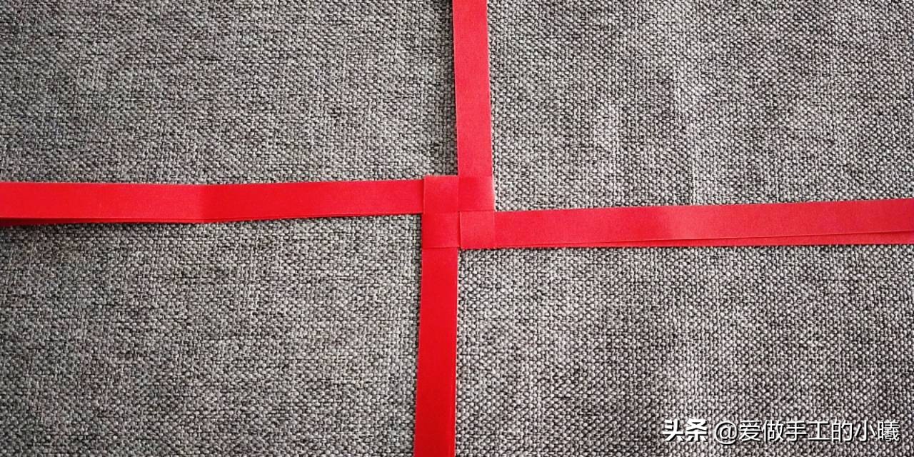 用纸条编织灯笼上面的穗子教程,用折星星的纸条做灯笼