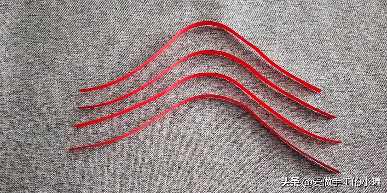 用纸条编织灯笼上面的穗子教程,用折星星的纸条做灯笼