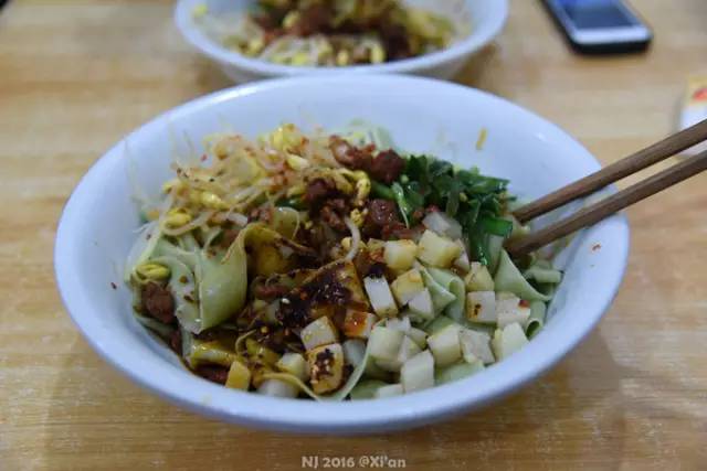 西安吃肉夹馍哪里最便宜,西安肉夹馍成都