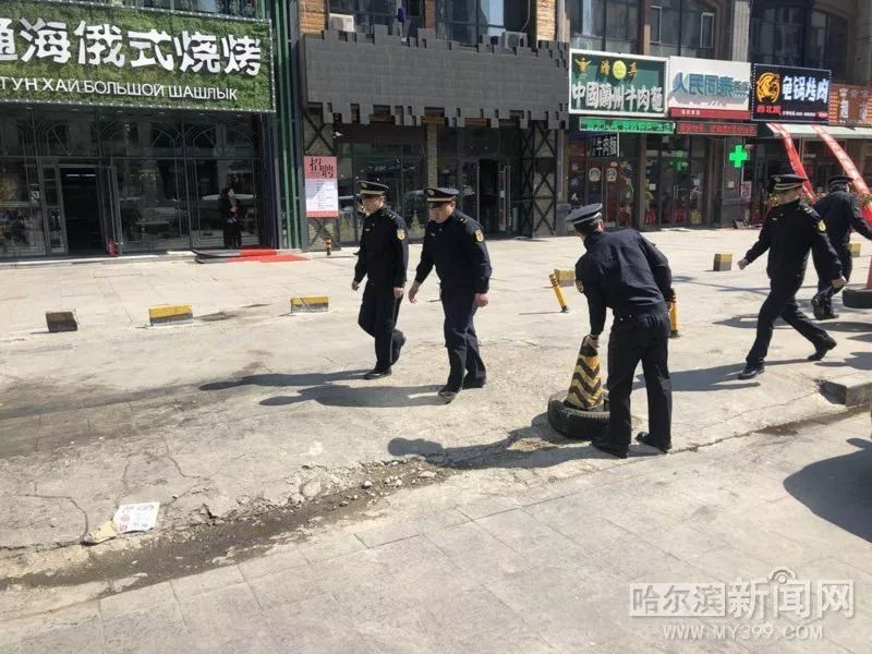 城管清理占道石墩,占道经营整治还路于民