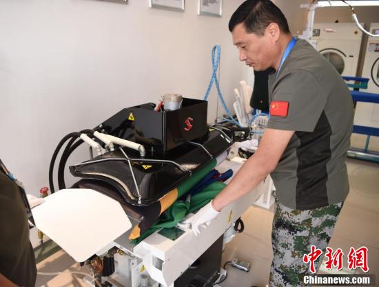 探访军运村洗涤服务保障组的军哥军嫂们