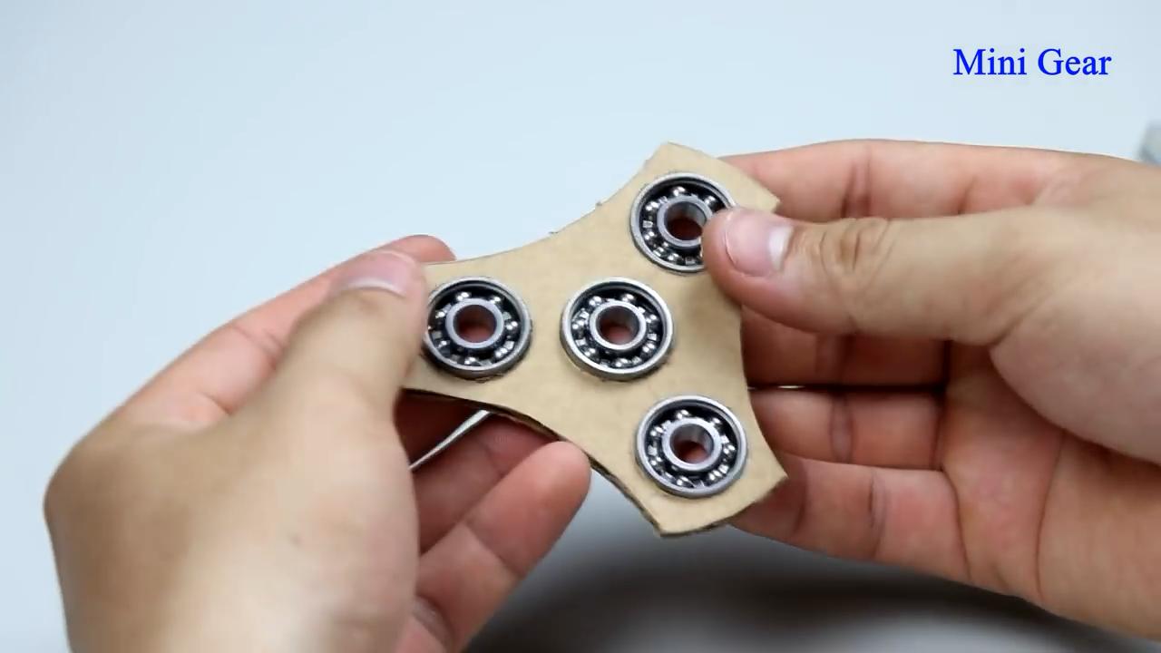 怎么用瓶盖做炫酷的陀螺,风火轮陀螺怎么做