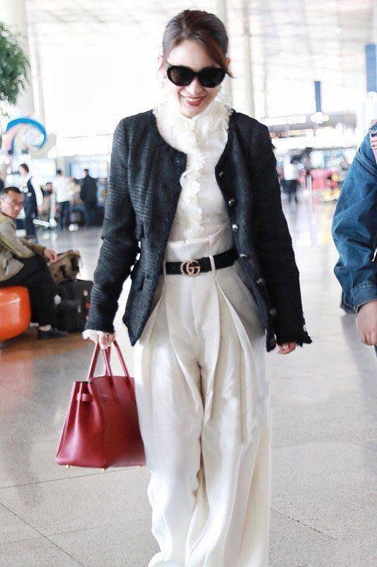 秦海璐胡先煦小辫子,41岁秦海璐现身机场